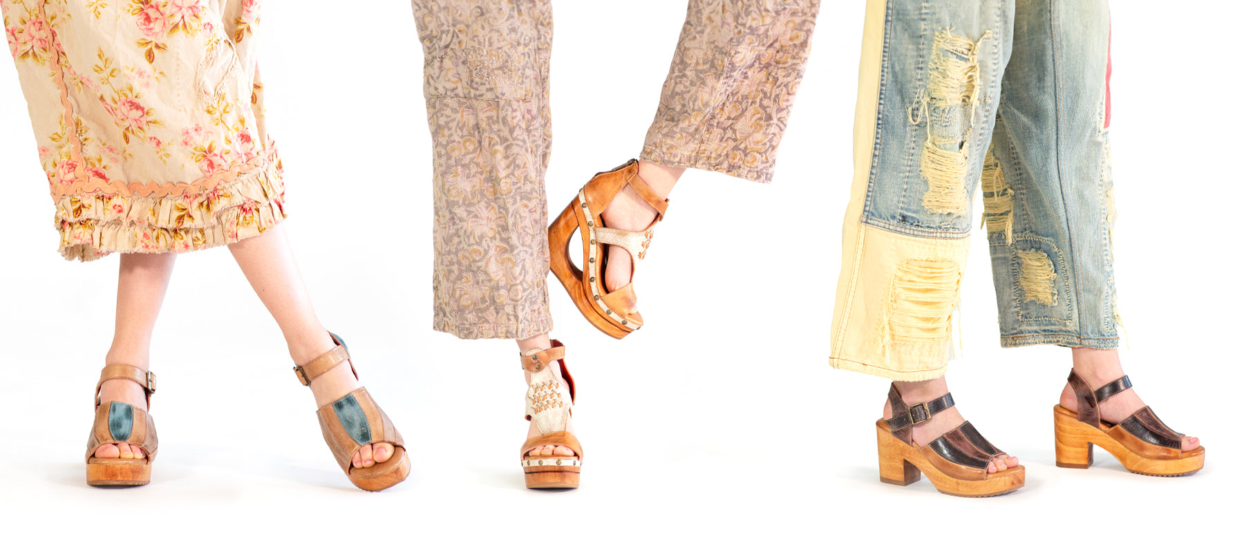 Three pairs of legs wearing different styles of high-heeled sandals and patchwork jeans.