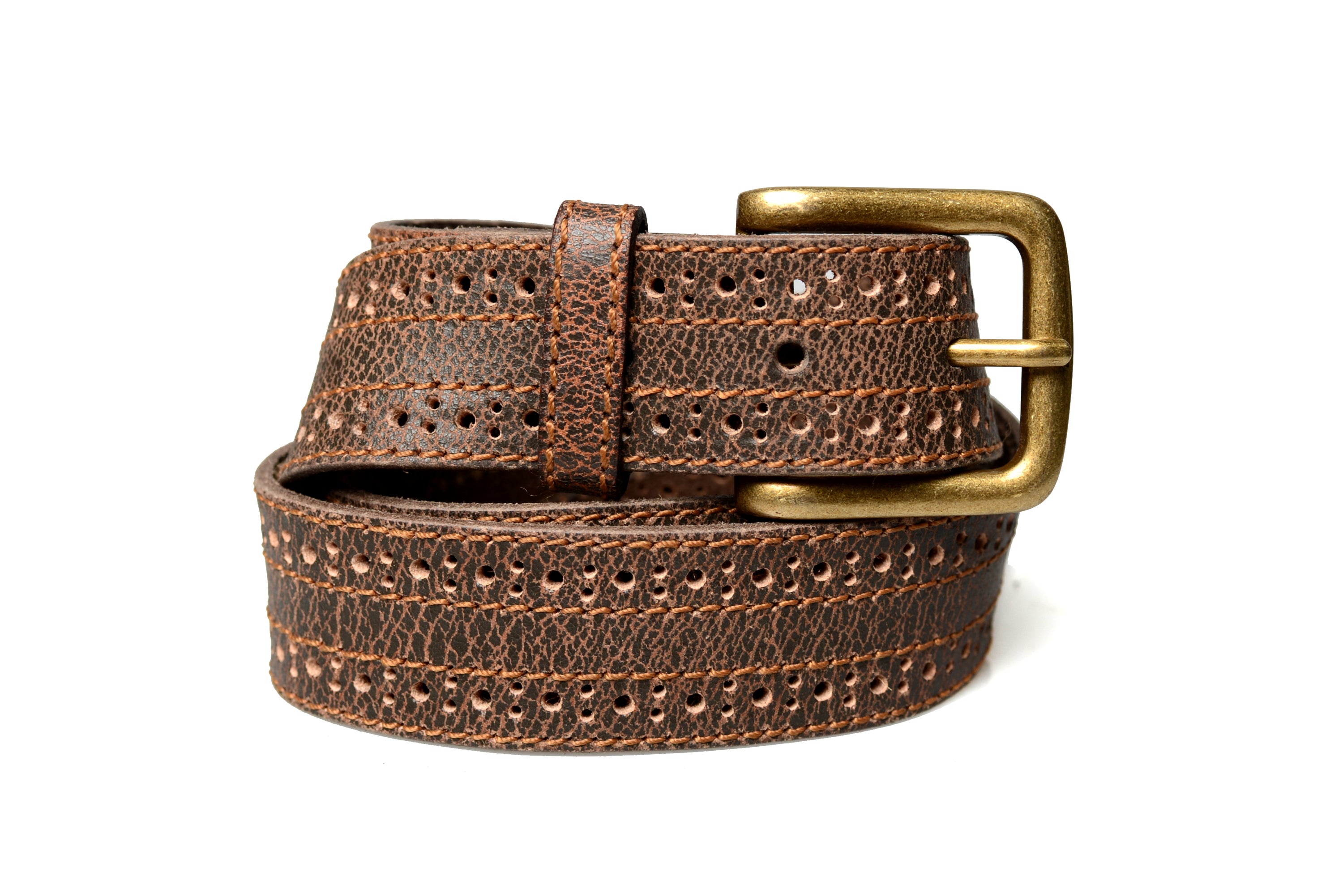 A brown leather belt with a brass buckle and silver grommets by Bed Stu's Addison.