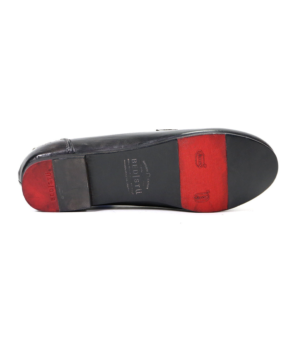 Ballet shoe sole with two-tone leather, displaying visible Bed Stu markings and a slightly textured surface.