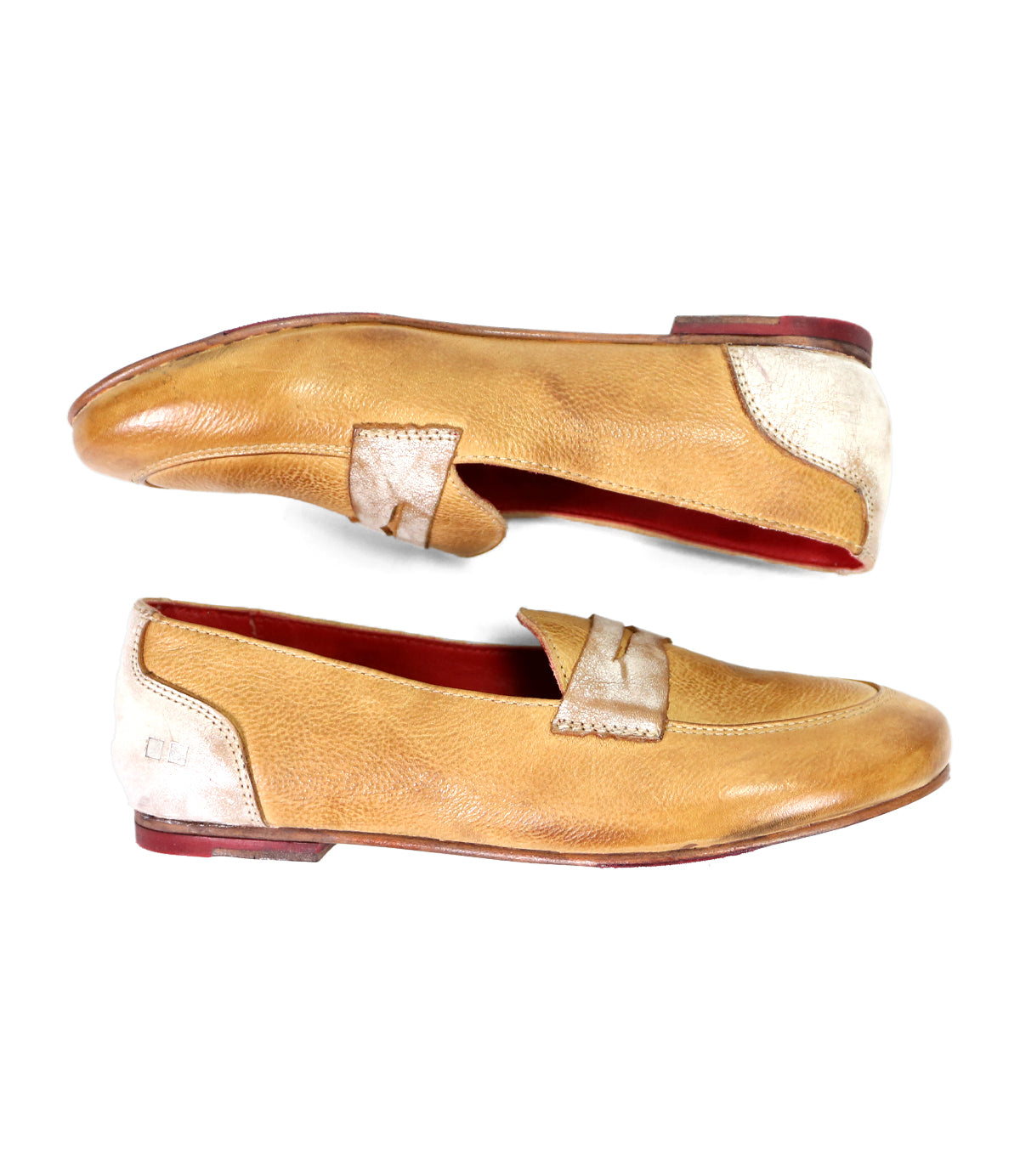 A pair of elegant tan two-tone leather Ballet loafers by Bed Stu with white detailing and a bow on top, photographed against a white background.