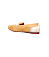 A worn Bed Stu two-tone leather loafer, predominantly yellow with a white back, depicted on a plain white background.