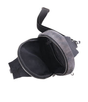 An open, empty gray leather Beau sling backpack with a zipper on a white background by Bed Stu.