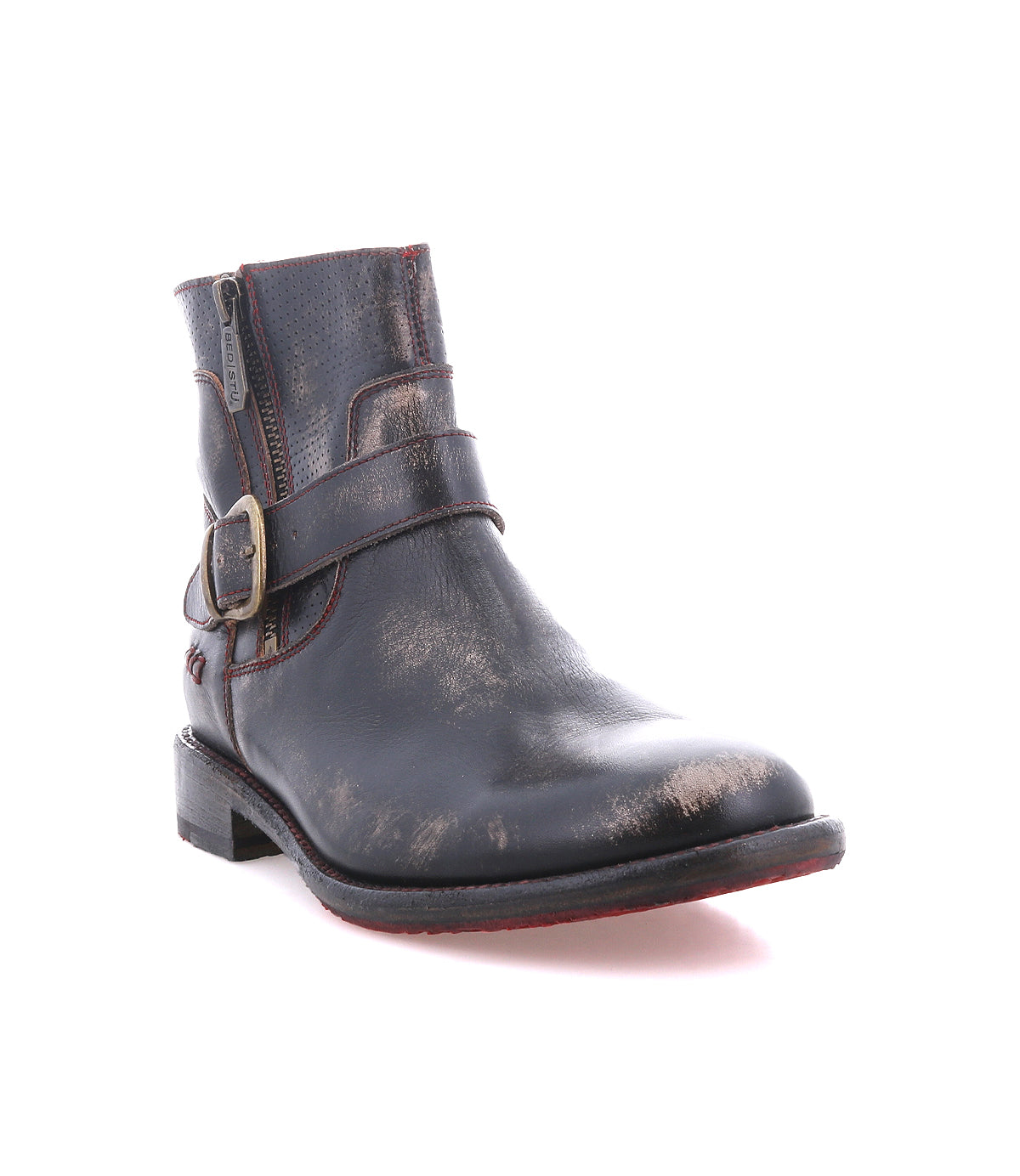The Bed Stu Becca is a black leather short engineer boot featuring dual zippers, an ankle buckle strap, a worn finish, and a low heel, displayed against a white background.