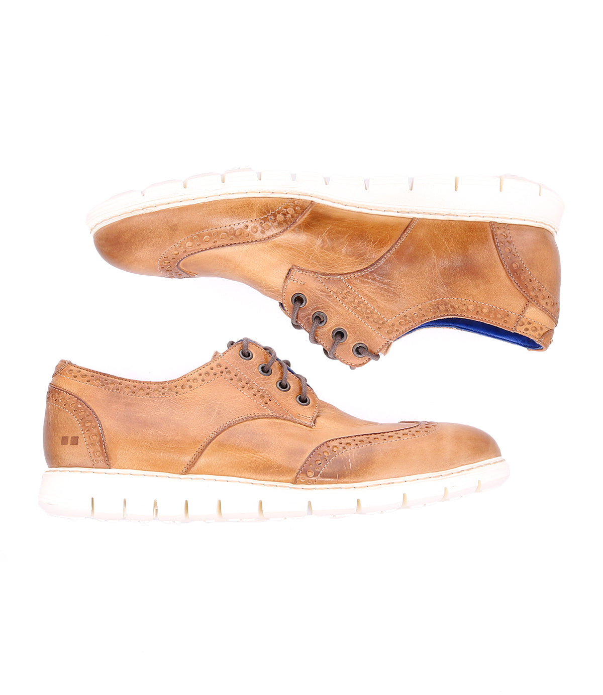 A pair of brown lightweight leather Cayuga II shoes perfect for contemporary casual male attire by Bed Stu.