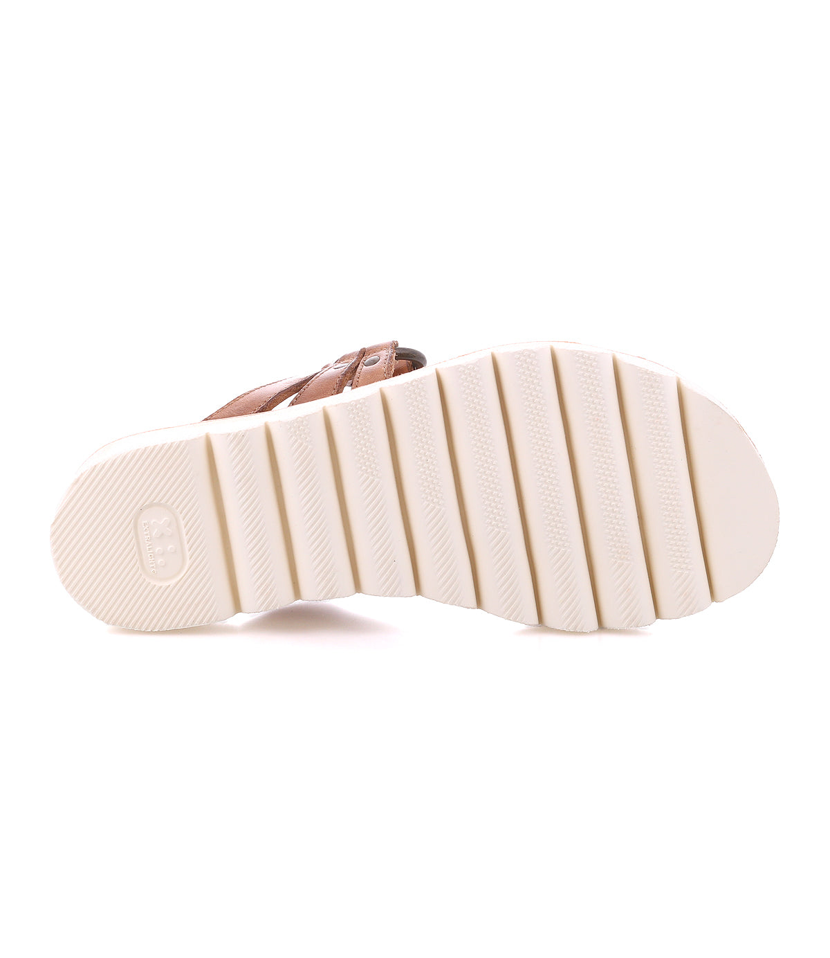 The image showcases Bed Stu's "Chow" sandal, featuring a statement chunky rubber sole with white textured horizontal grooves and a light brown upper edge.