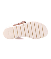 The image showcases Bed Stu's "Chow" sandal, featuring a statement chunky rubber sole with white textured horizontal grooves and a light brown upper edge.