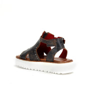 A women's Clancy sandal from Bed Stu with straps and a white sole featuring XL EXTRALIGHT® technology for shock absorbing.