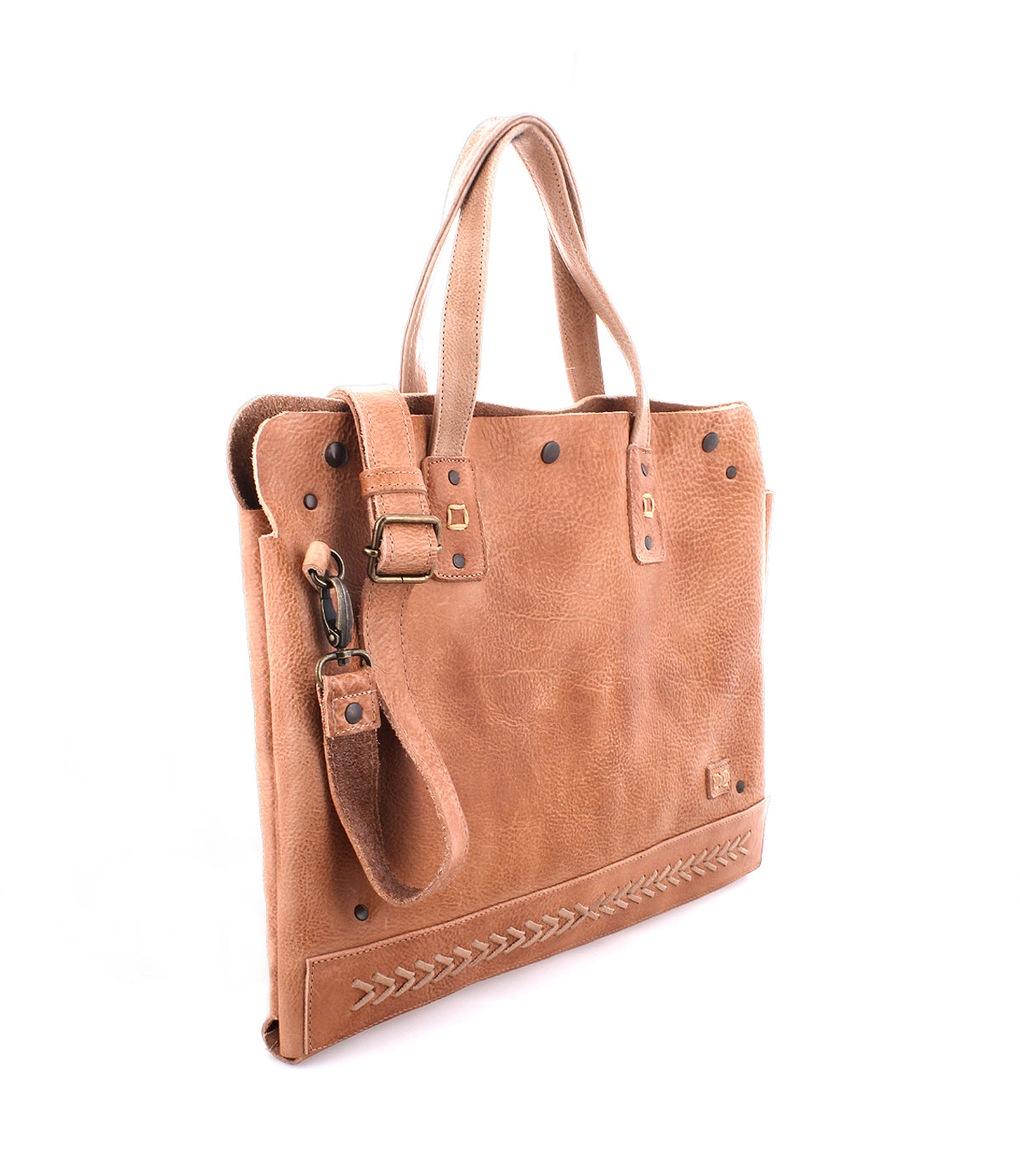 A multifunctional Bed Stu tan leather Commuter laptop bag with a strap designed to accommodate laptops up to 15 inches.