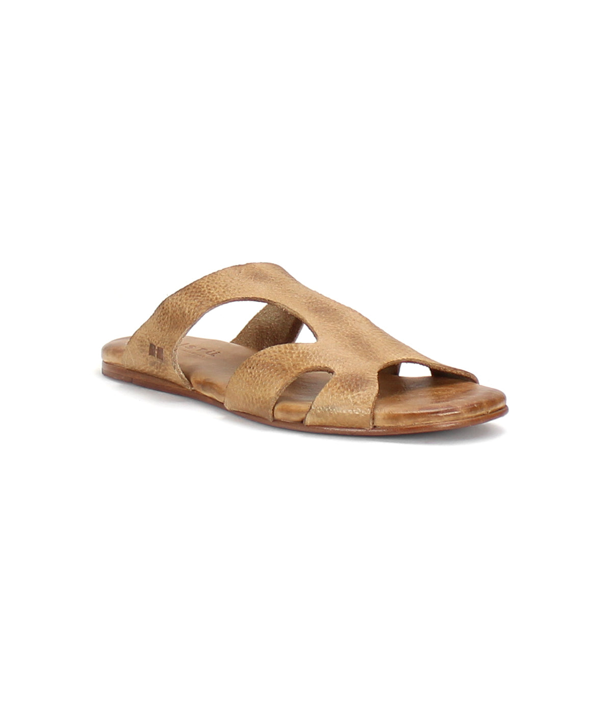 A single brown Configure leather sandal from Bed Stu with multiple cutouts, a flat sole, and a cushioned inner sole crafted from vegetable-tanned leather upper.