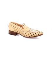A beige handcrafted penny loafer made of perforated leather, featuring a playful circular cutout pattern and a low wooden heel, the Cornflower by Bed Stu.
