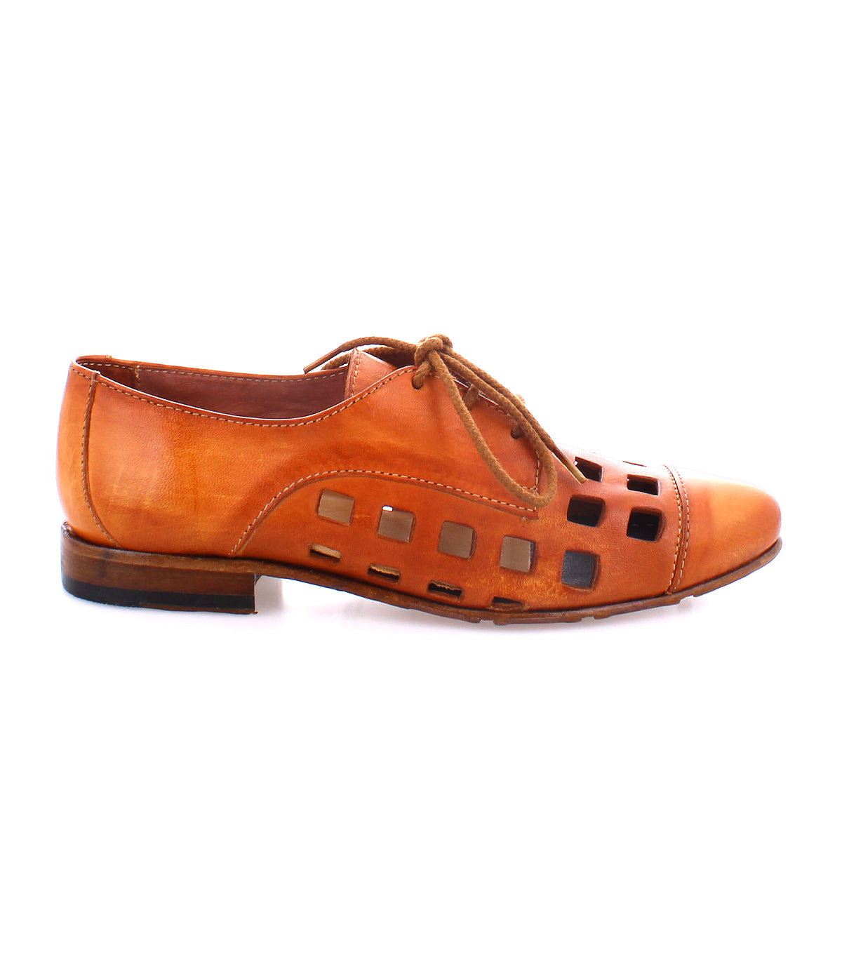 A brown leather dress shoe with bold square cutout patterns and a playful lace-up derby, featuring a low wooden heel, handcrafted in Italy - the Decoy by Bed Stu.