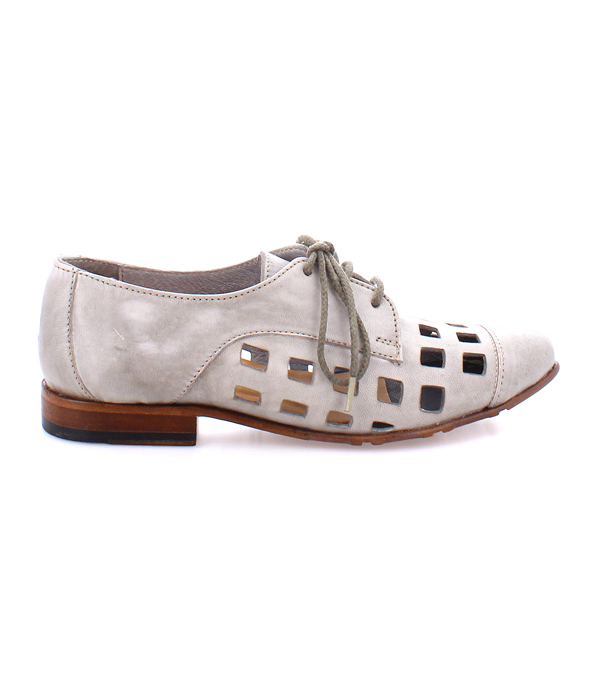 A beige, playful lace-up derby with bold square cutouts on the sides and toe area, handcrafted in Italy—Decoy by Bed Stu.