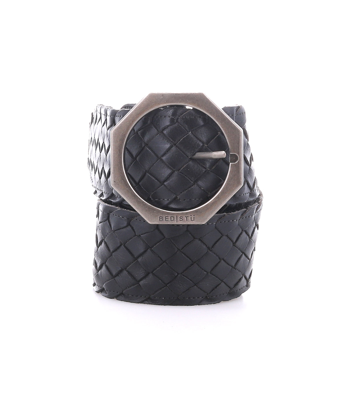 The Bed Stu Dreamweaver is a black woven leather belt with vintage allure, featuring a large octagonal silver buckle, rolled up and displayed on a white background.