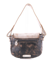 The Bed Stu "Elect" is a vintage-style brown leather shoulder bag with a front zipper pocket, flap closure, short strap, and metal "Bed Stu" label on the front.