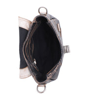 Top view of the Bed Stu Elect shoulder bag, featuring a brown finish, adjustable strap, zippered inner pocket, black fabric lining, and metallic side accents for added style and convenience.