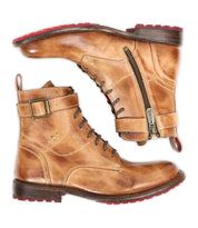 The Bed Stu Endure boots feature a tan leather upper, lace-up front, side zippers, buckles, red rubber soles, and leather lining for rugged sophistication. Shown in a side view.