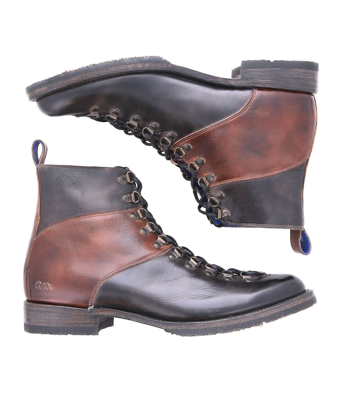 A pair of Bed Stu Frenzy brown and black leather lace-up boots is displayed in a side view, placed horizontally with soles facing outward. Crafted with Goodyear welt construction, these men's hiking boots offer durability and style, making them perfect for outdoor adventures.