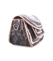 A pre-owned Bed Stu Gilda crossbody bag in black dual-finished leather, showing visible scuffs and scratches with a metal ring detail and light-colored trim.
