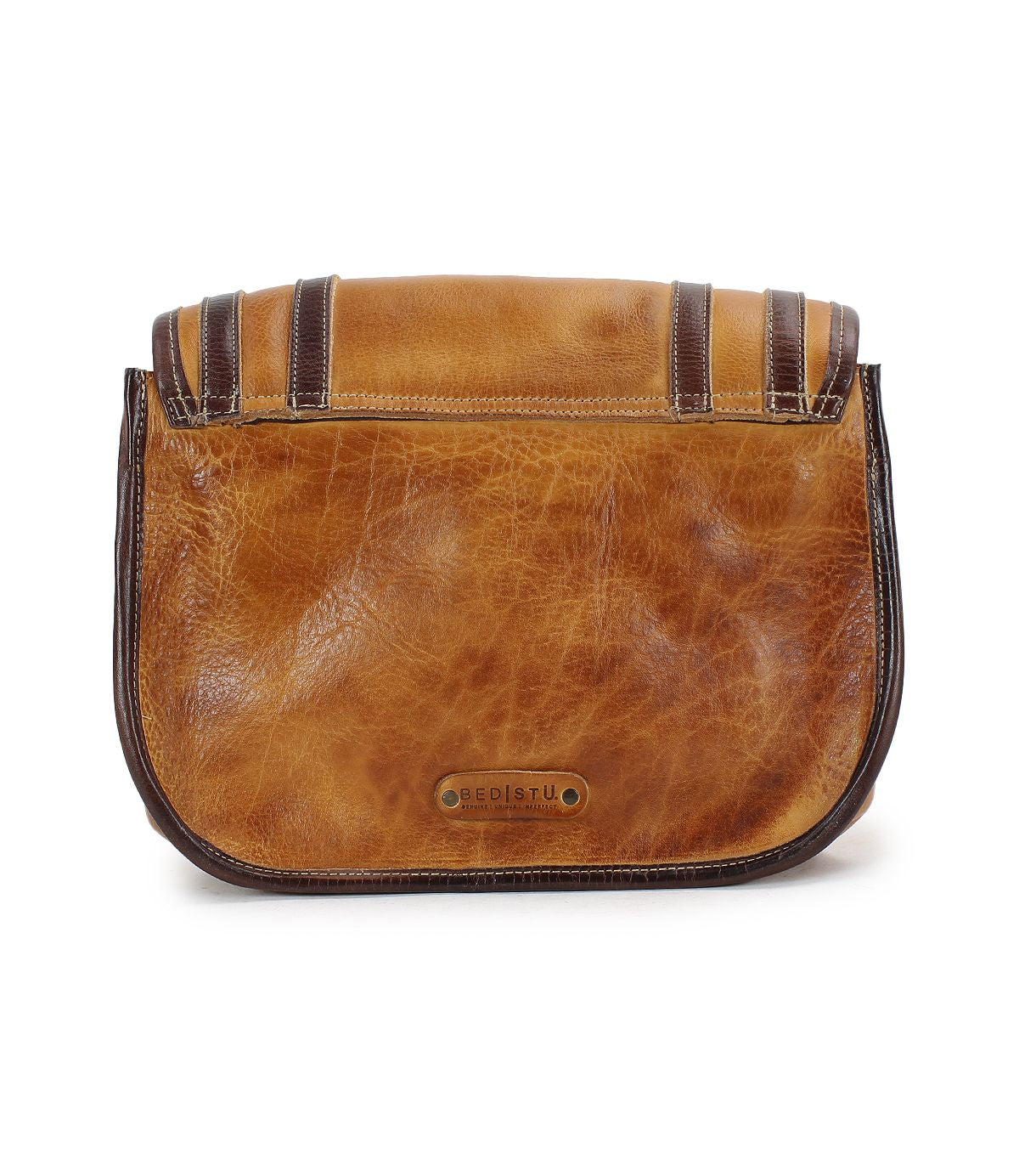 The Gilda by Bed Stu is a brown leather clutch with dual-finished leather, featuring dark trim and the brand's logo on the front.