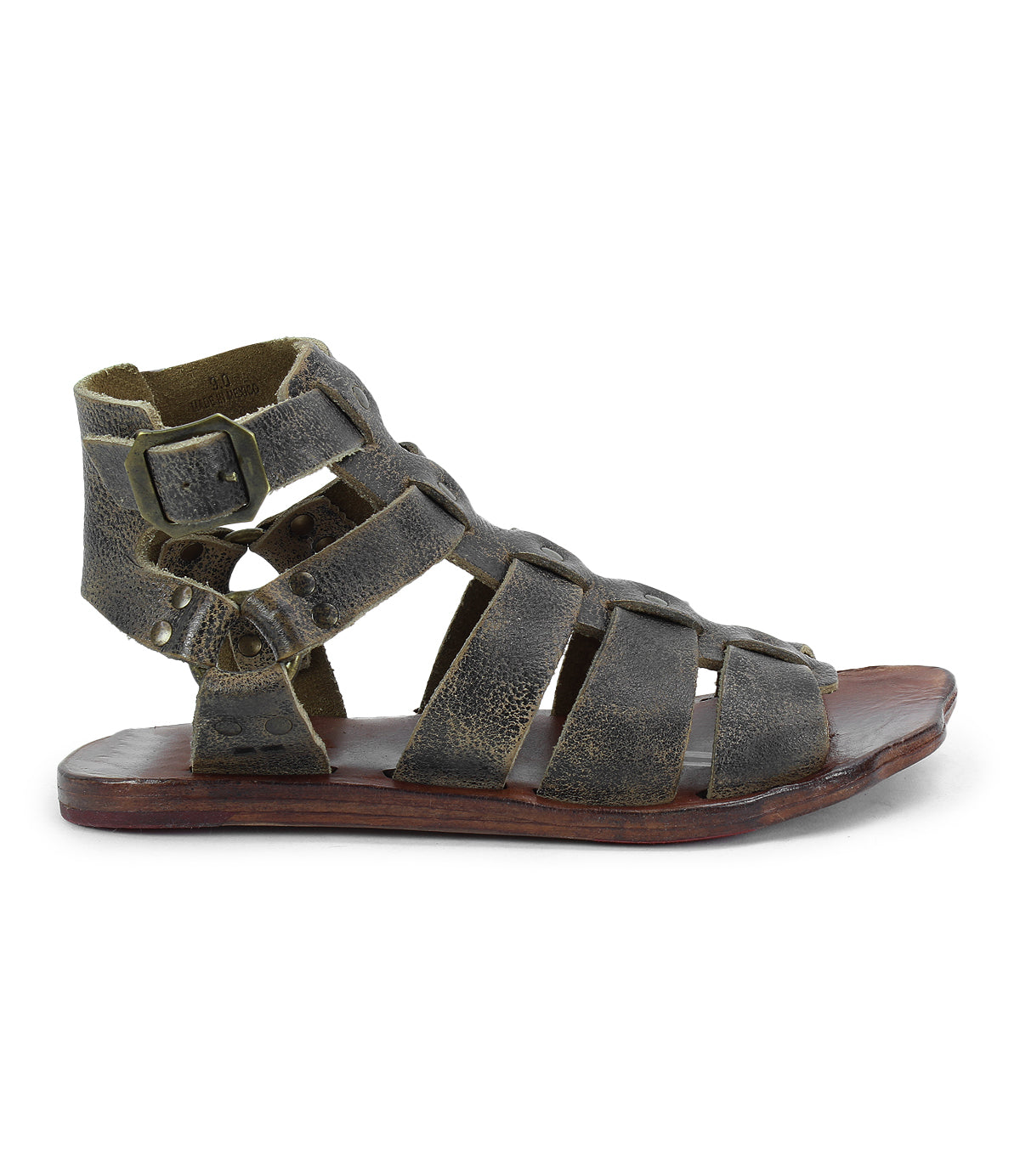 Hera by Bed Stu: Brown strappy gladiator sandals with a flat wooden sole, featuring a side buckle closure, leather outsole, and weathered texture.