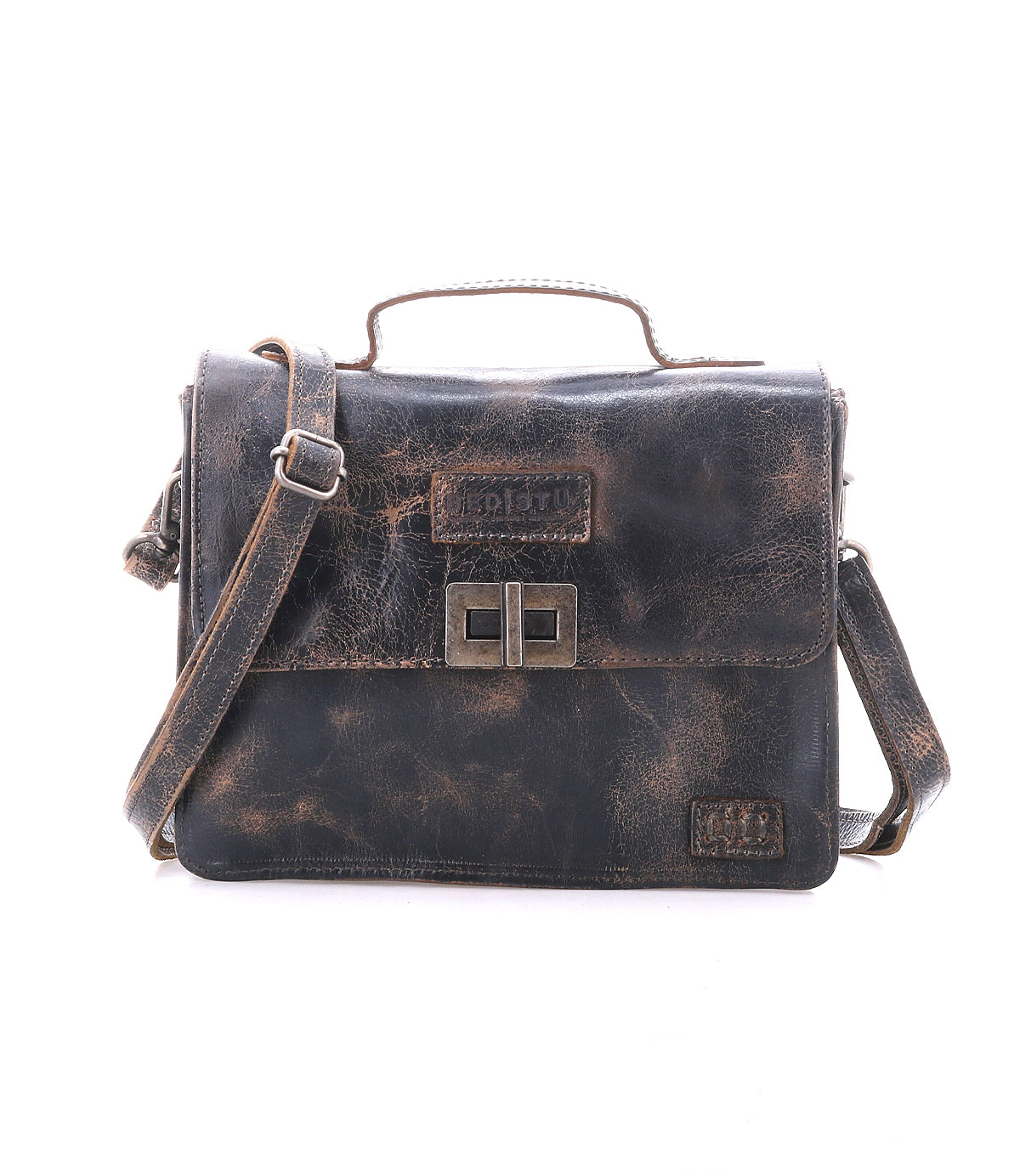 The Bed Stu Improv is a worn brown leather satchel with a front flap, metal buckle closure, top handle, and adjustable crossbody strap, blending style and function against a plain white background.