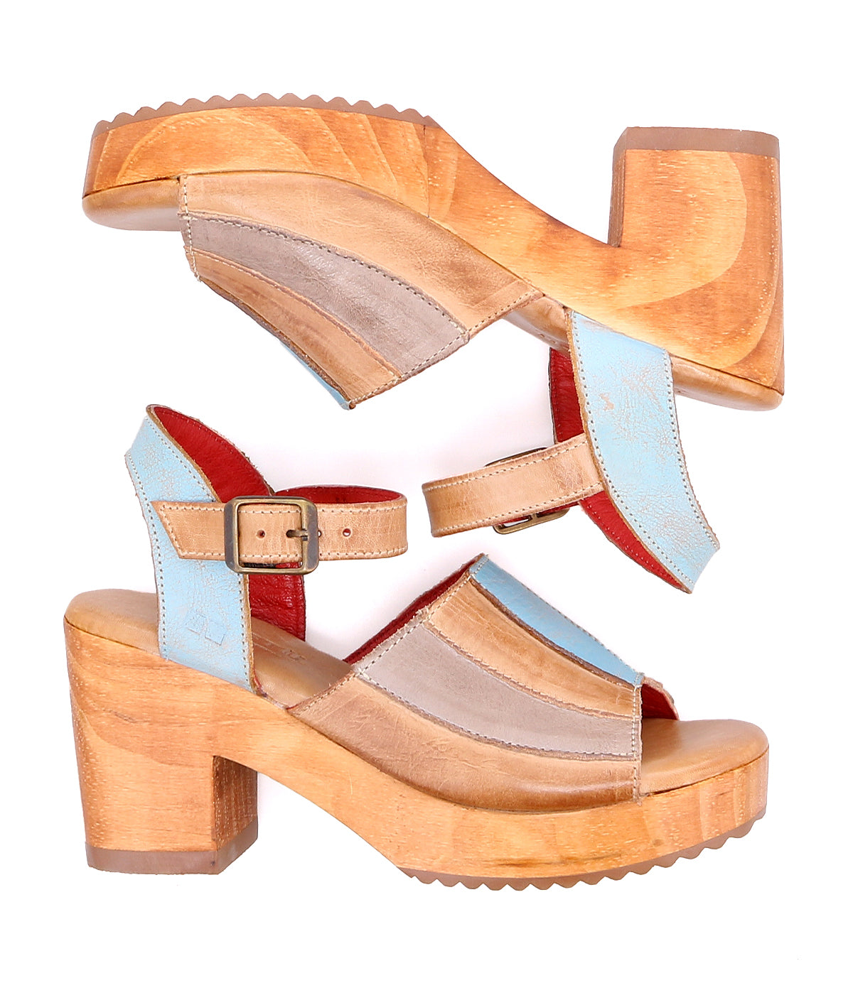 A pair of Jetsetter wooden sandals with blue straps and leather heels by Bed Stu.
