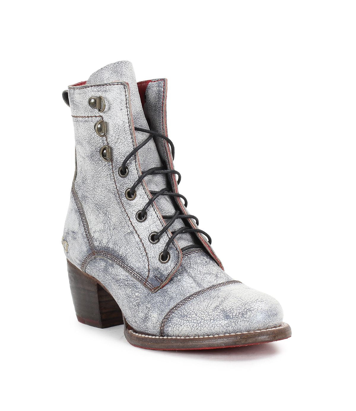 The Judgement ankle boot by Bed Stu is crafted from gray leather and showcases a lace-up design with black laces, metal eyelets, and a chunky wooden block heel.