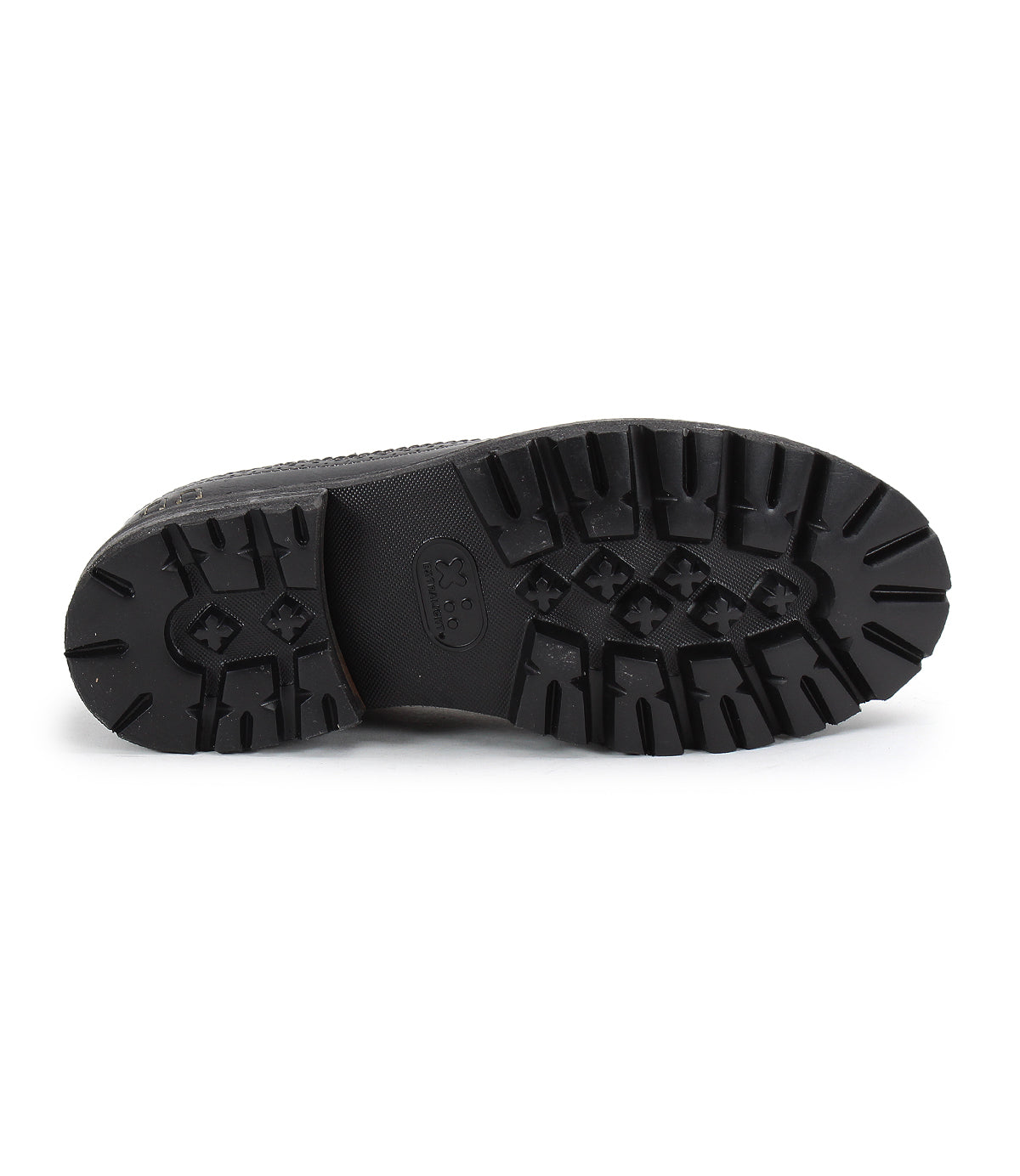 The image shows the textured sole of a black boot, displaying deep treads and a rugged design for additional traction. With hints of retro chic, this Lita K III by Bed Stu combines practicality with timeless style.