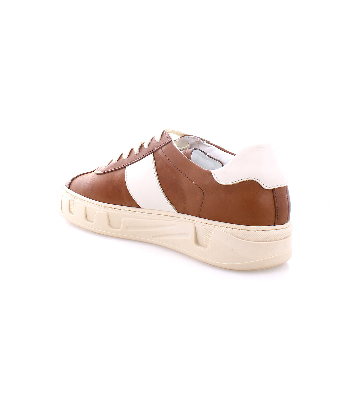 A brown and white luxury leather sneaker with a cream-colored sole, viewed from an angle showing the back and side, features an avant-garde design that offers a sleek yet customizable fit: the Law by Bed Stu.