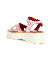 The Bed Stu Lift is a pink platform sandal with a thick white sole and adjustable ankle strap, shown from the back left—an ideal warm-weather staple.