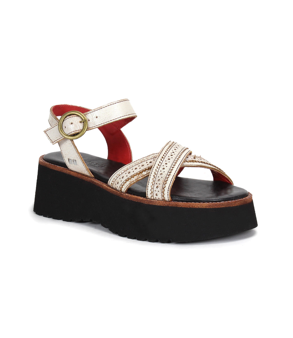 The Bed Stu Lift is a white platform sandal featuring a thick black sole, crisscross straps, decorative stitching, and an adjustable strap—perfect for adding stylish comfort to your warm-weather outfits.