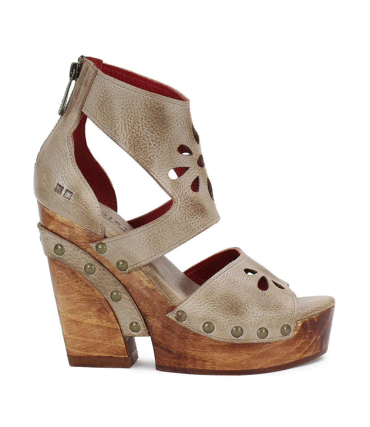 A women's sandal with wooden platform and cut outs from Bed Stu's Lucrative.