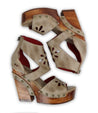 A pair of Bed Stu Lucrative women's sandals with wooden wedges platform.