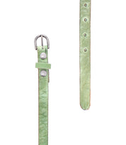 Two views of the Monae green skinny leather belt by Bed Stu with metal buckles and rivets—one highlights the buckle, the other shows punched holes. A stylish way to add a subtle boho touch to any outfit.