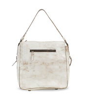 The Packet LTC by Bed Stu is a distressed white leather shoulder tote bag with a front zippered pocket and a comfortable shoulder strap.