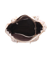 The interior of a Rockababy SL handbag made from upcycled leather, featuring a zipper for easy closure by Bed Stu.