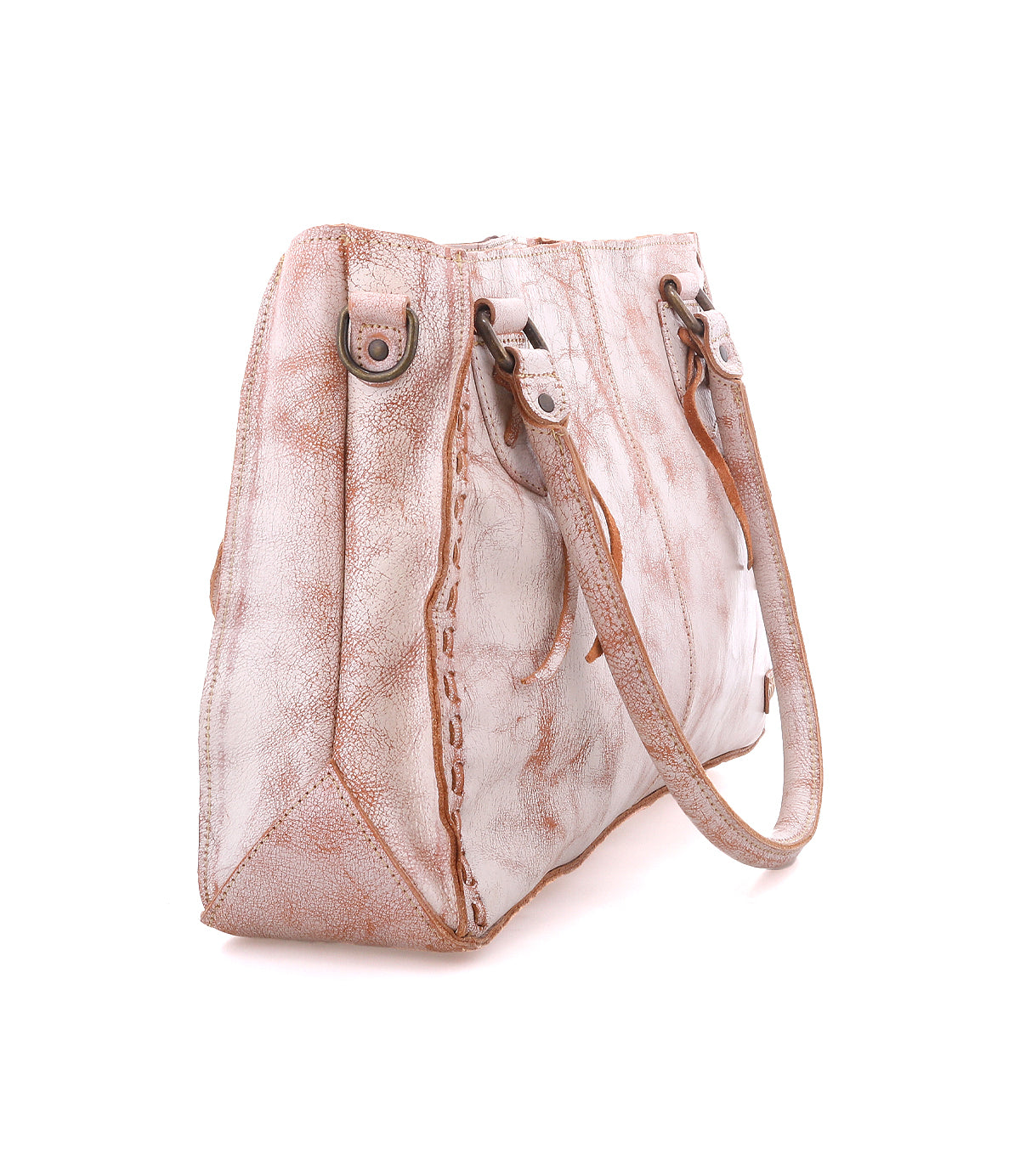 The Rockababy by Bed Stu is a textured beige handbag with brown accents, two handles, metal details, and a stitched design. It comes with a crossbody strap for added versatility.