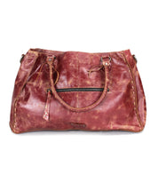 The Bed Stu Rockaway is a large, distressed brown leather handbag with double handles, a zip-pocket divider, and a front zipper pocket, shown on a plain white background.