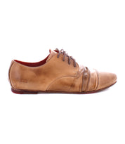 Side view of a brown leather lace-up **Bed Stu Rumba II** shoe with visible scuff marks and wear, featuring a slightly pointed toe and low heel, exuding 1920s wingtip flair.
