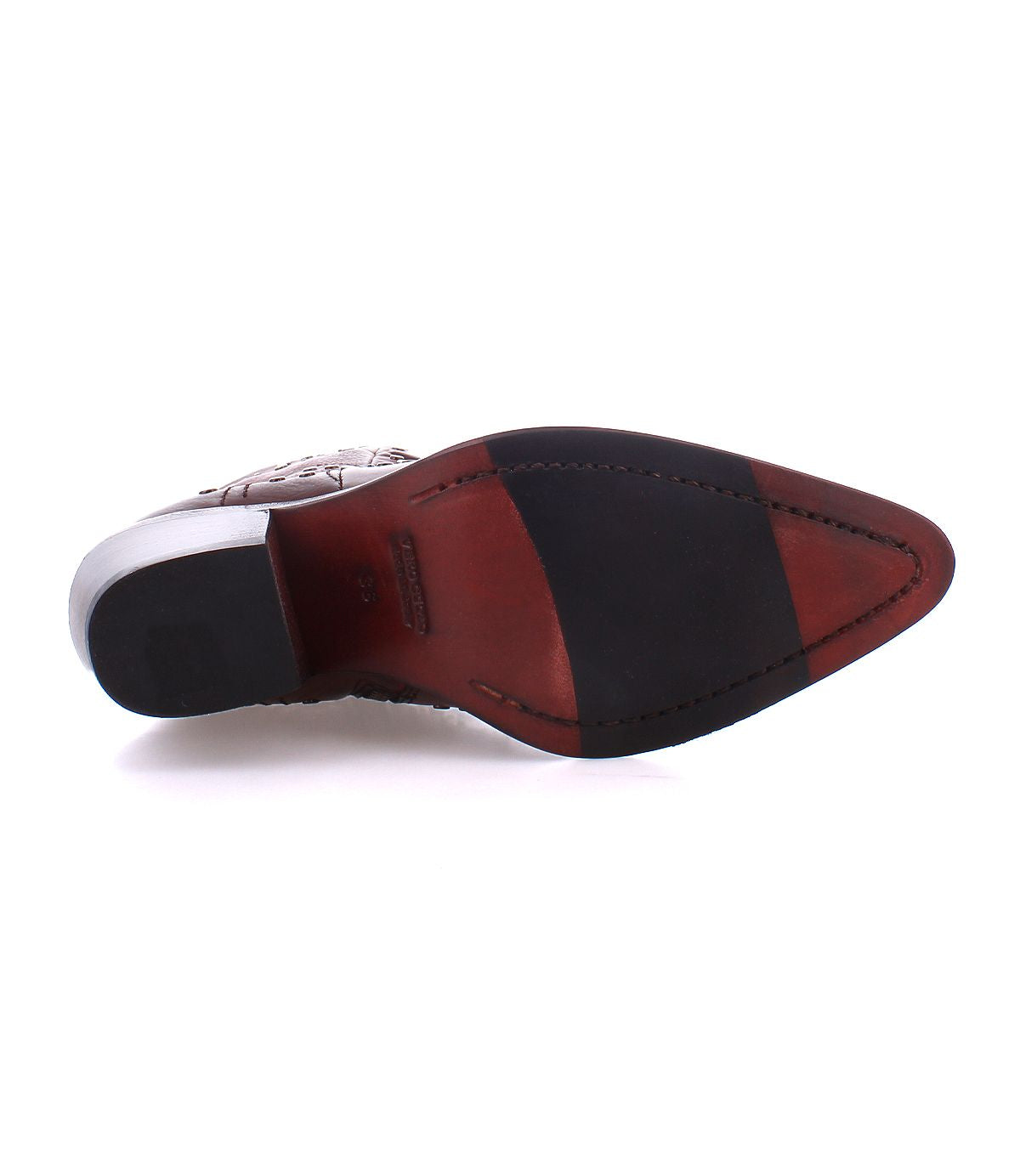 Bottom view of the Sposa dress shoe by Bed Stu, crafted from vegetable-tanned leather, with a sole made of leather and rubber that highlights intricate stitching and tread designs.