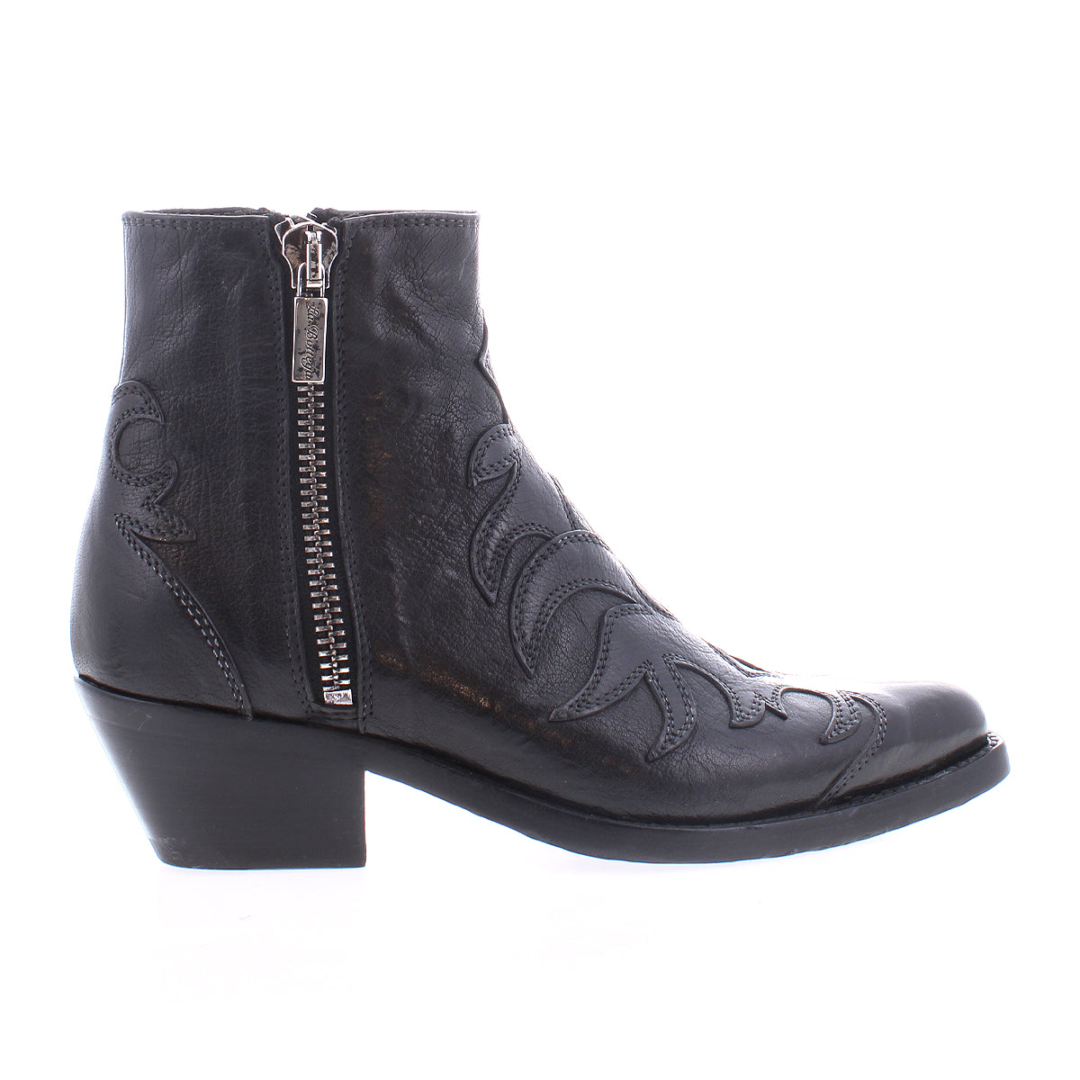 The Bed Stu Tentativa is a black leather ankle boot featuring artisan details, a side zipper, decorative stitching on the upper, and a low block heel, shown in profile against a white background.