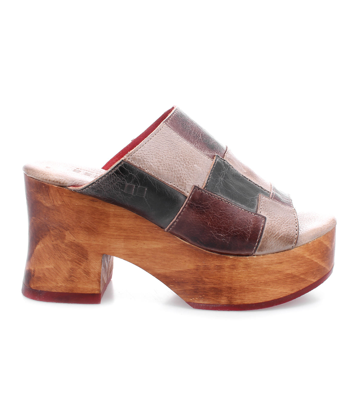 A women's Vanquish wooden clog with an open-toe design and a patchwork pattern by Bed Stu.