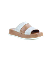 The Bed Stu Vext is a brown and beige platform slide sandal featuring a wide strap and flat leather-wrapped sole, shown on a plain white background.