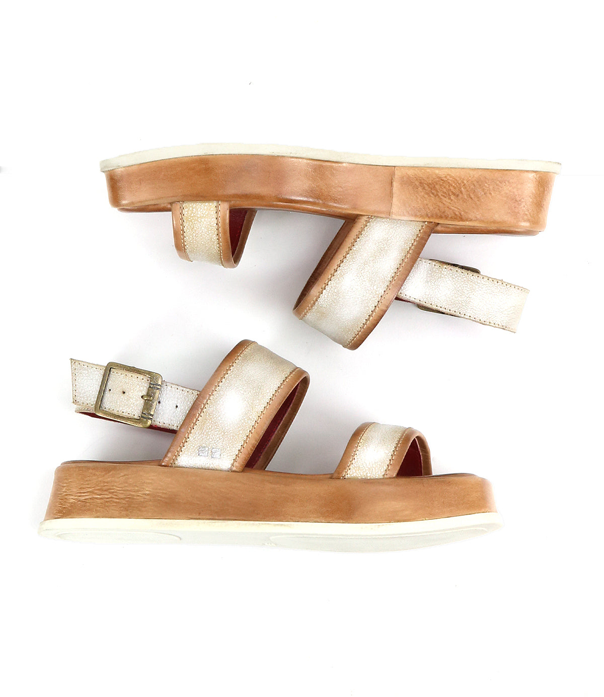 The Bed Stu Vice sandals feature platform tan soles and metallic gold adjustable ankle straps with buckles, displayed side by side on a white background.