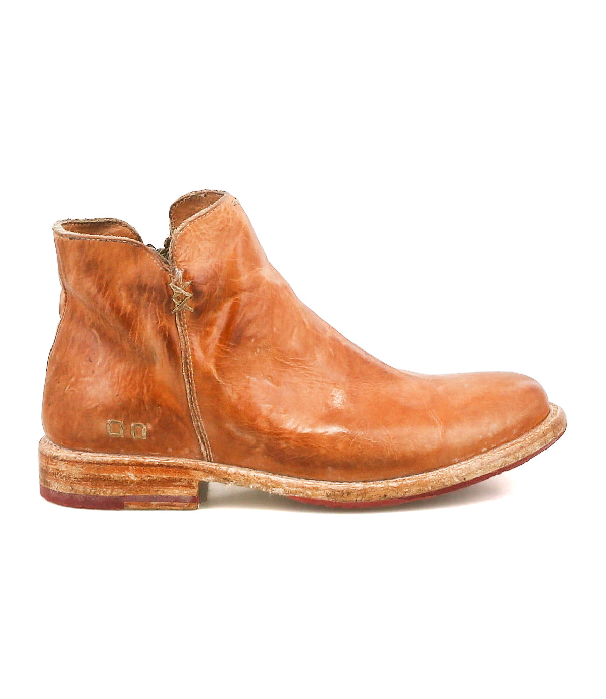 The Yurisa by Bed Stu is a brown leather ankle boot with visible creases, a slight heel, and a scuffed Vibram outsole—shown in profile against a white background, making it an ideal everyday choice.