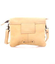The Ziggy by Bed Stu is a tan leather crossbody bag featuring a front pocket, adjustable strap, and a metal Bed Stu logo plate—perfect for hands-free convenience on your daily adventures.