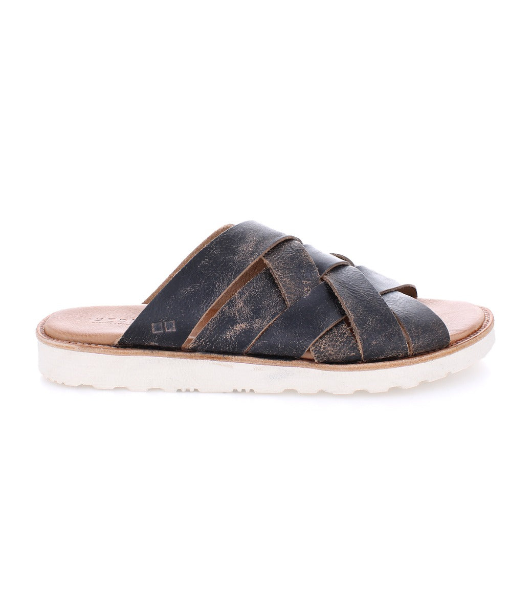 A single Abraham Light leather slide sandal with criss-cross straps, displayed against a white background. (Bed Stu)