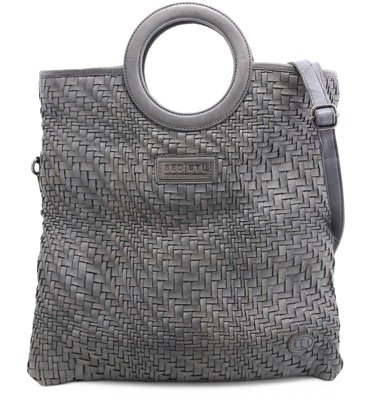 A grey woven Adele bag with a Bed Stu metal handle.