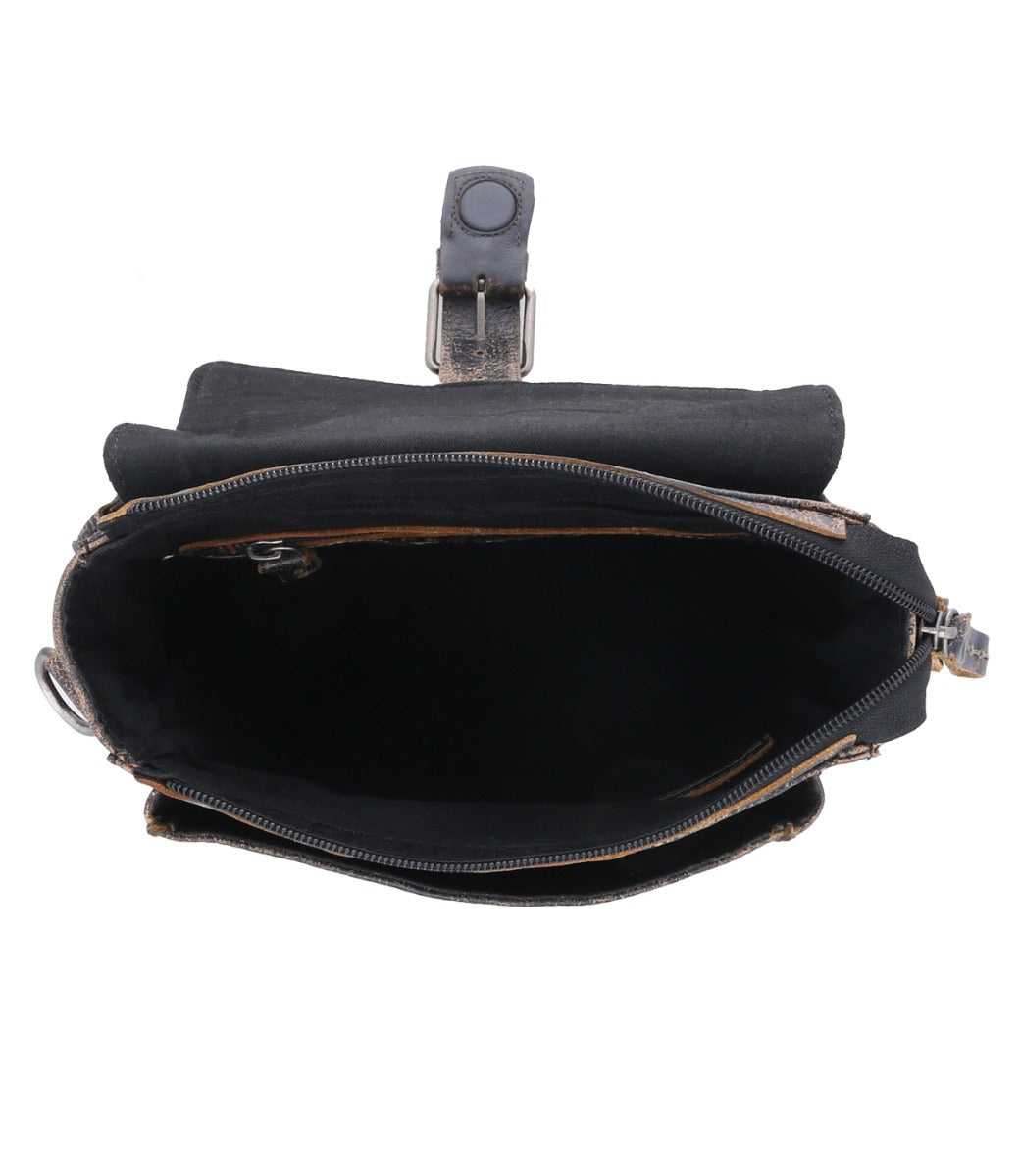 Open black leather Ainhoa LTC waist bag by Bed Stu with an adjustable strap and a visible interior, showing an empty main compartment and a closed front pocket, isolated on a white background.