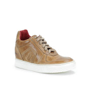 The Bed Stu Andromeda, a high-top sneaker featuring brown leather with beige laces, a white sole, and a red interior lining, boasts a street-smart design.